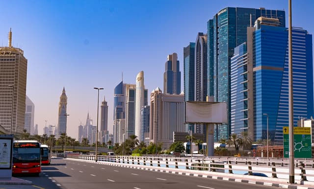 Traffic on Sheikh Zayed Road with Dubai towers behind